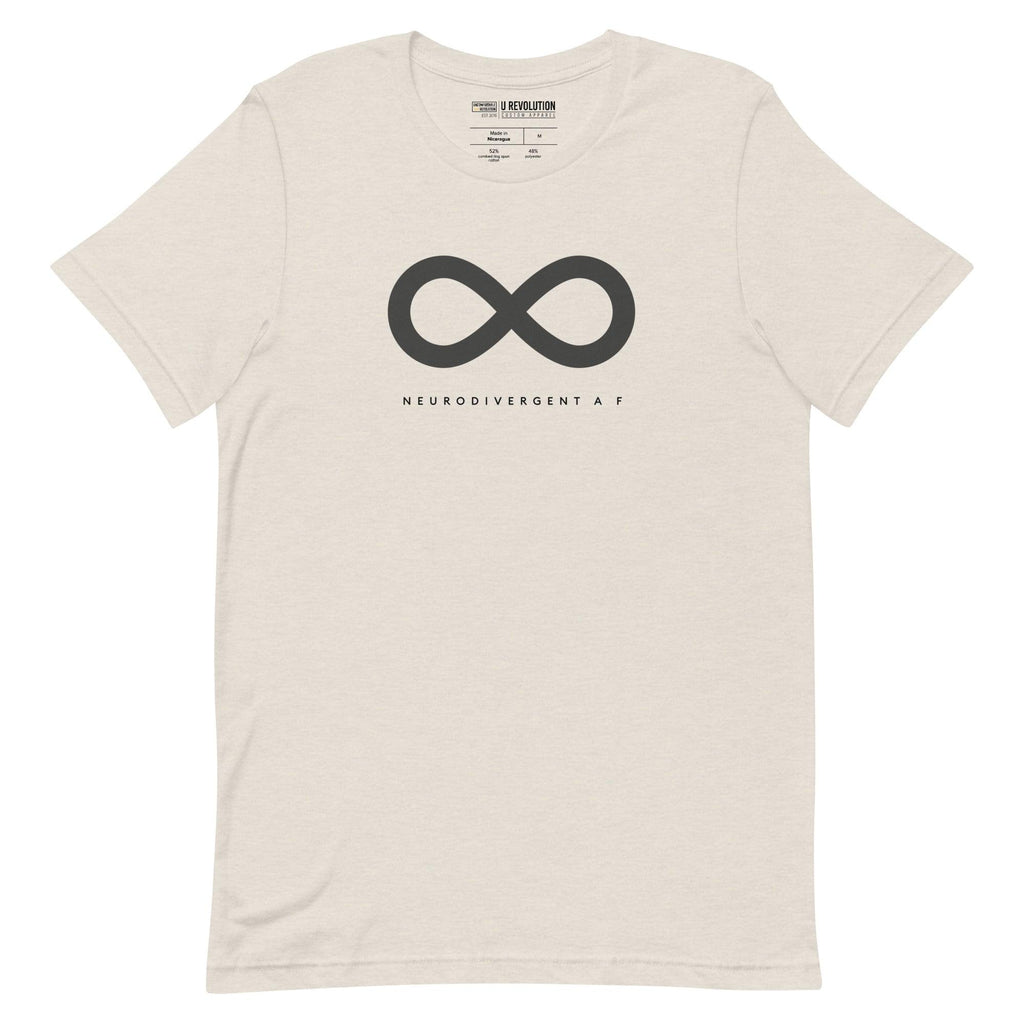 This is a photo of a heather-dust Neurodivergent AF Shirt. In the top third of the Neurodivergent AF tee, there is a black infinity symbol. Under the symbol is the phrase, 'Neurodivergent AF,' in black upper case letters.