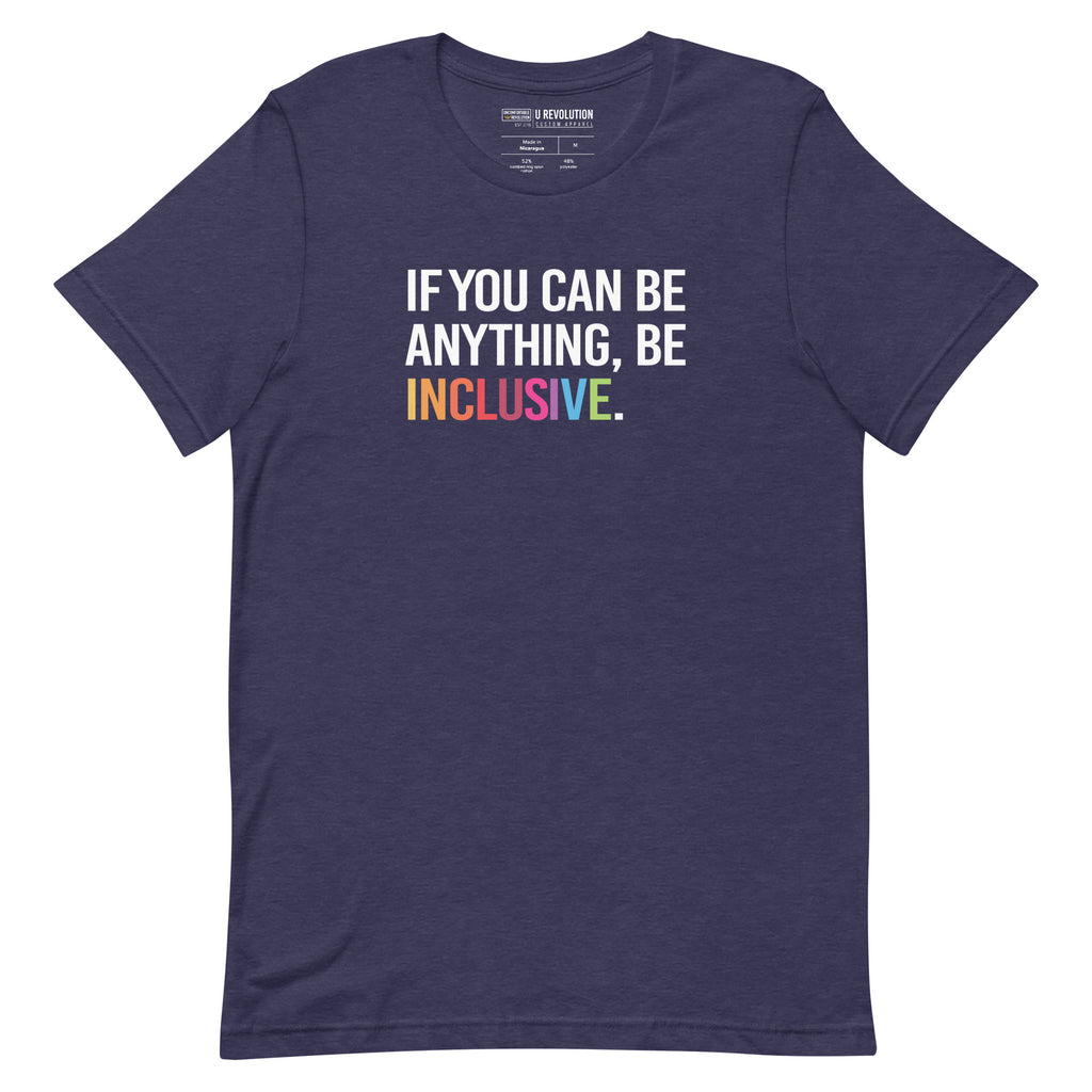 This is a photo of a heather-midnight navy rainbow classic Be Inclusive tee. On the front of the inclusive t-shirt is the phrase: "If you can be anything, be inclusive," in white upper case letters. All the text is in white, except "Inclusive," which is in rainbow colors.