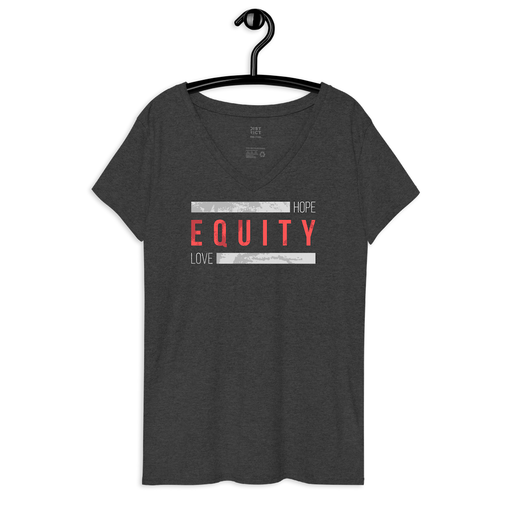 A charcoal heather helo equity women recycled v-neck shirt. One inch below the bottom of the v-collar is the word 'Equity' in upper case red letters. Above and below the word are two thick distressed grey rectangle blocks with the word HOPE printed on the top right hand side, and the word LOVE on the bottom right side of the block. The tee is on a black hanger.