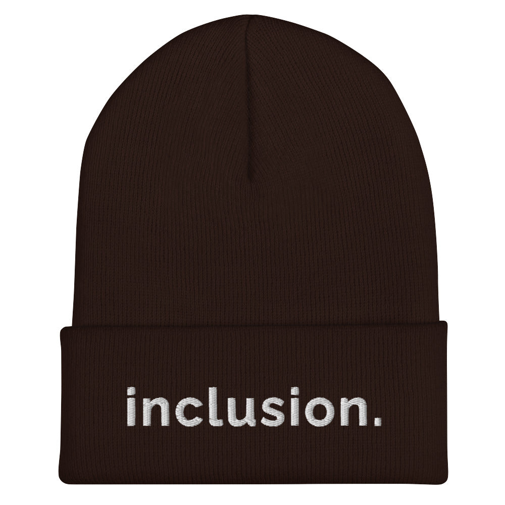 Brown Inclusion beanie against a plain white background. On the front of the beanie, the word 'inclusion' is embroidered on the front middle of the cuff in white sentence case letters.