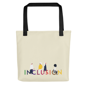 A disability inclusion tote bag has the word INCLUSION printed in rainbow-like colors on one side. The inclusion tote is canvas color with black straps. Four diverse disabled people have incorporated into the phrase INCLUSION: a blind person, a person with an invisible illness, a disabled person with a prosthetic limb, and a disabled person in a wheelchair.