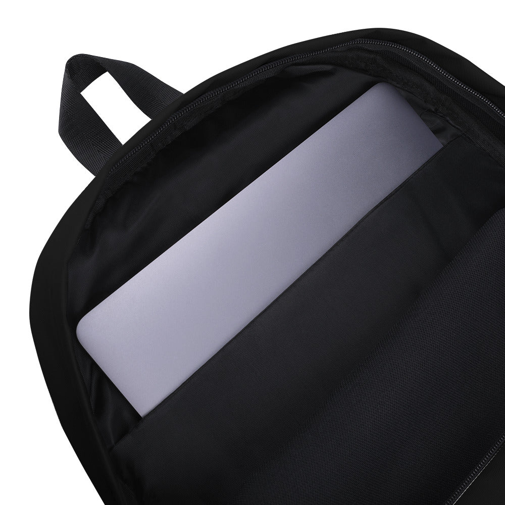 A close up of the inside of the black back-pack showing a laptop inside an inner laptop pocket.