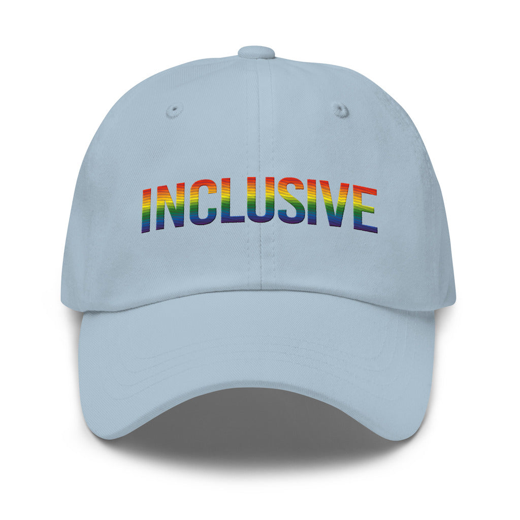 Light blue inclusive gay pride baseball cap with the word 'inclusive' embroidered in the front middle of the cap in upper case LGBT pride colors. 