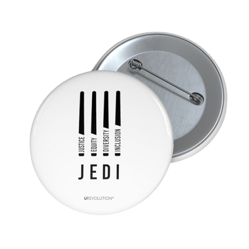A photo of a Justice Equity Diversity Inclusion pin by URevolution. In the middle of the white pin are four white lightsabers. At the bottom of each saber representing the saber handle is one word: Justice Equity Diversity Inclusion. Beneath the sabers is the acronym JEDI. 