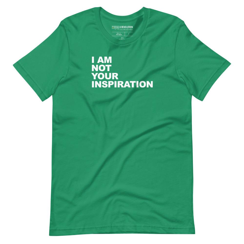 This is a kelly green 'I Am Not Your Inspiration" t-shirt. On the top third of the inspiration shirt is the phrase, "I am not your inspiration," printed over four lines in white upper case letters.
