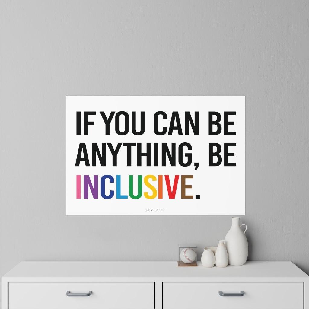 This is a photo of a Be Inclusive decal. In the middle of the wall decal, taking up 90% of the surface area is the quote in upper case letters: "If you can be anything, be inclusive." The words - be inclusive - are in the colors of the rainbow. The inclusive decal is placed on a gray wall above a set of draws.