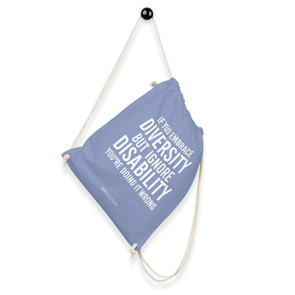 A light denim Embrace Diversity organic cotton drawstring bag. The middle of the drawstring bag features the phrase, printed in large white upper case letters, "If you embrace diversity but ignore disability, you're doing it wrong." The phrase fills 80% of the bag. 