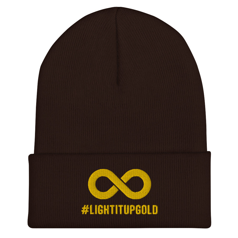 Light it up gold beanie. A thick bold gold infinity symbol is in the middle of a brown beanie. Directly under the symbol in upper case letters is the word #LIGHTITUPGOLD