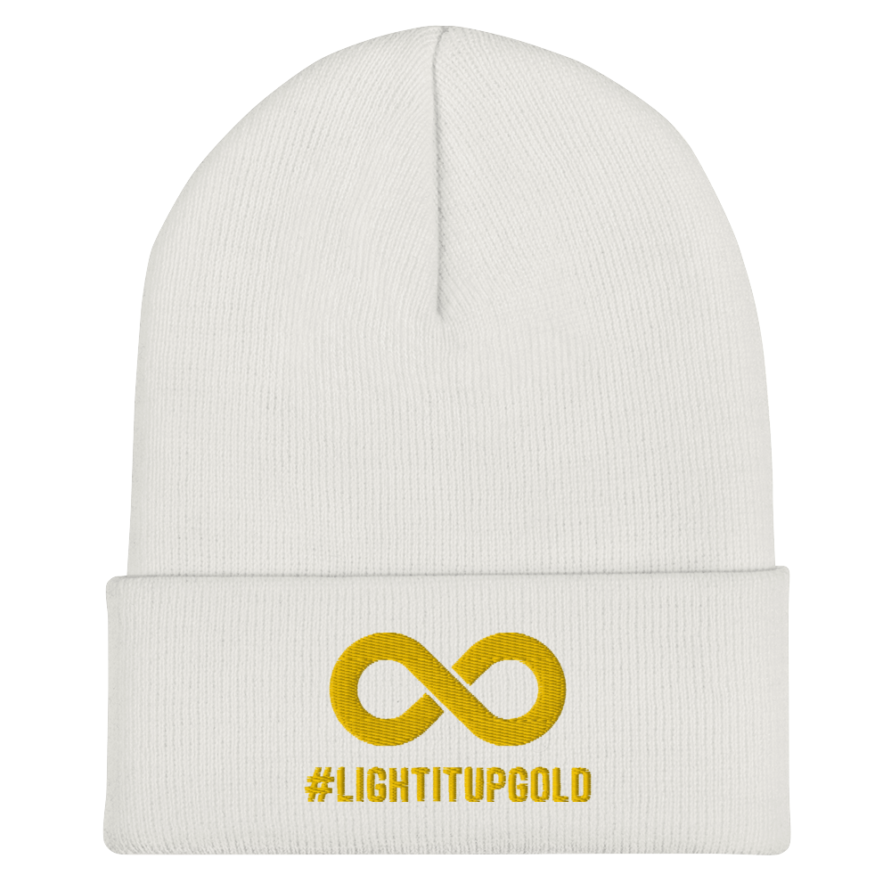 Light it up gold beanie. A thick bold gold infinity symbol is in the middle of a white beanie. Directly under the symbol in upper case letters is the word #LIGHTITUPGOLD