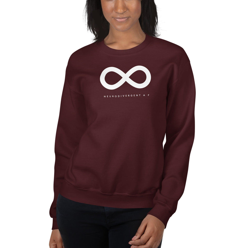 Maroon Neurodivergent AF sweatshirt. There is a white infinity symbol in the top third of the Neurodivergent AF sweatshirt. Under the symbol is the phrase, 'Neurodivergent AF,' in white upper case letters.  The sweatshirt is worn by a female model with only her torso visible.