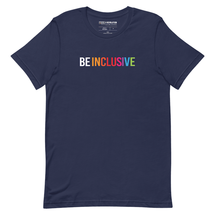 Navy Be Inclusive t-shirt with text printed in big caps says "BE INCLUSIVE". BE is in white, and INCLUSIVE is in rainbow colors. Both words are in one line across the top of the shirt.