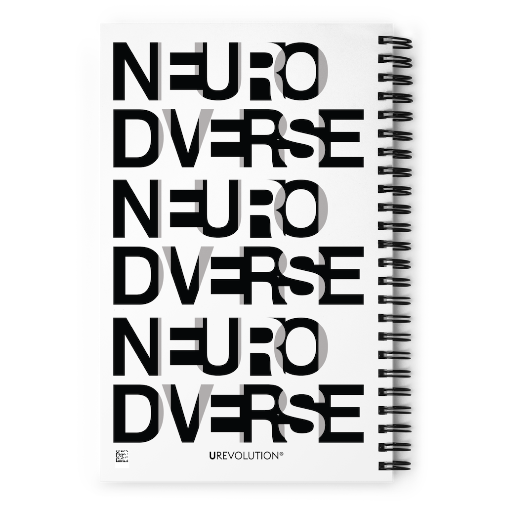 The back cover of a Neurodiverse Notebook has a fabric pattern with the word NEURODIVERSE printed all over in repeating black and white alternating letters. The letters are printed in large uppercase letters that overlap.