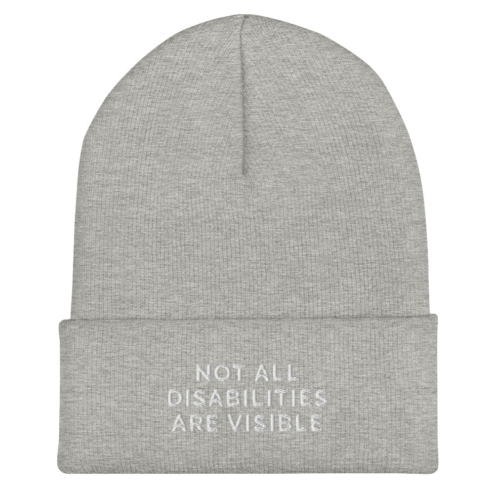 A heather grey Not All Disabilities Are Visible Beanie. The phrase, "Not All Disabilities Are Visible," is embroidered on the front of the beanie.