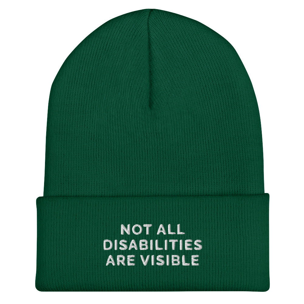 A spruce Not All Disabilities Are Visible Beanie. The phrase, "Not All Disabilities Are Visible," is embroidered on the front of the beanie.