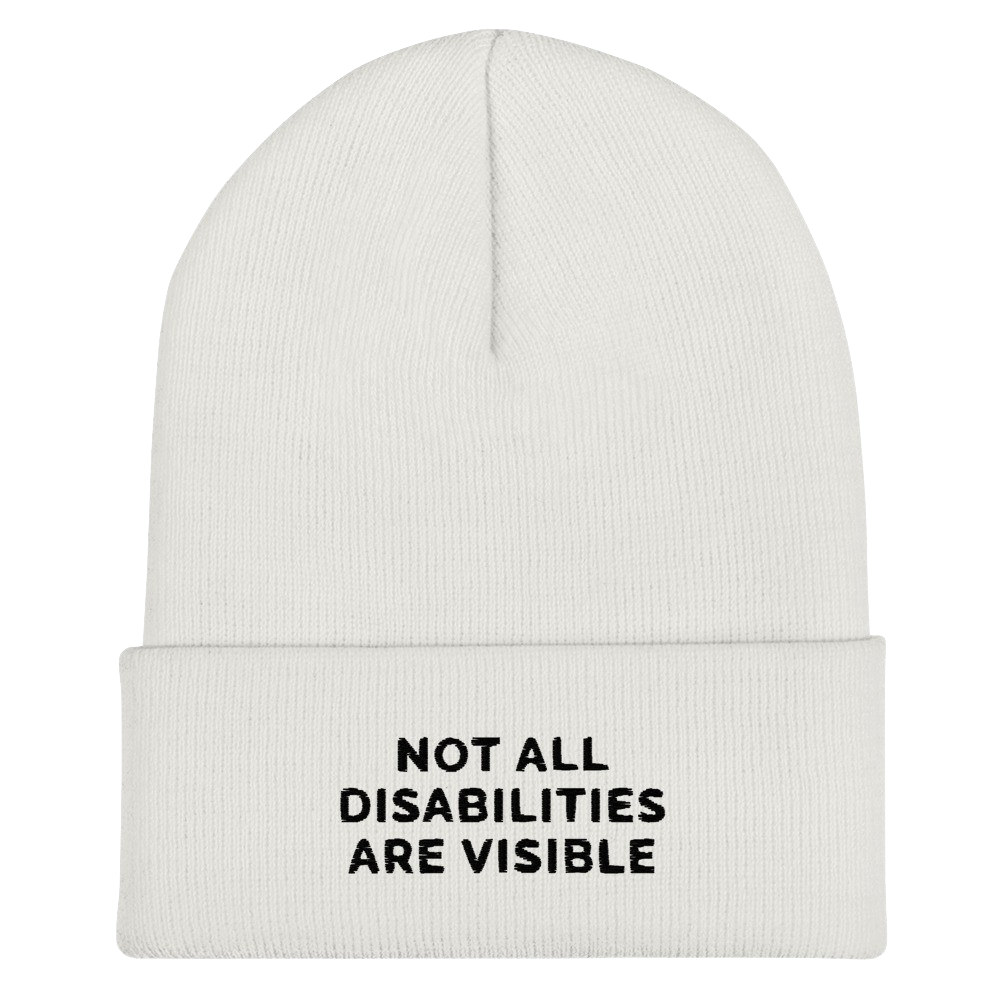 A white Not All Disabilities Are Visible Beanie. The phrase, "Not All Disabilities Are Visible," is embroidered on the front of the beanie.
