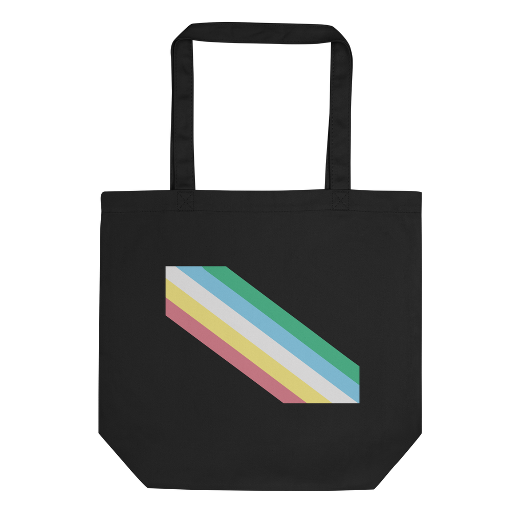 This is an image of an organic disability pride flag tote bag. In the middle of the black tote bag there are five diagonal stripes in this order: red, yellow, white, blue, and green (when looking from the bottom up).
