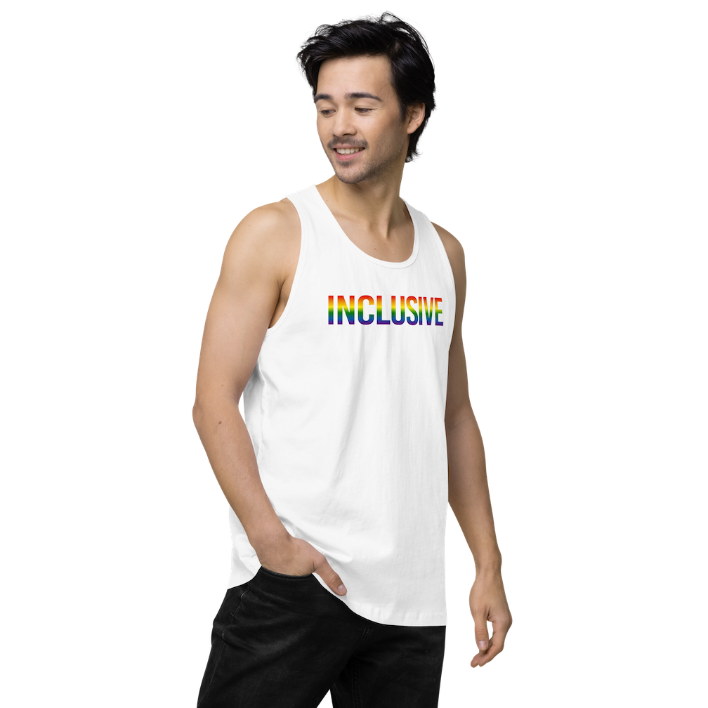 Photo of a white premium inclusive pride tank top. In the middle top 1/3 of the tank top is the word "Inclusive." The word is written in blended upper case rainbow pride colors:  red, orange, yellow, green, indigo, and violet. 
