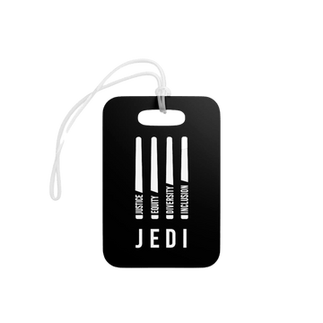 This is a photo of a rectangle black JEDI luggage tag. In the middle of the JEDI luggage tag is URevolution's original JEDI graphic of four vertical stylized white "JEDI" lightsabers. Included in each saber is one word: justice, equity, diversity, and inclusion in white upper case letters. Beneath the graphic is the word JEDI.