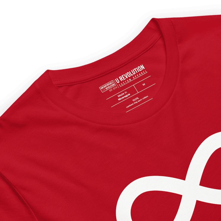 Red Neurodivergent AF Shirt. In the top third of the Neurodivergent AF tee, there is a white infinity symbol. Under the symbol is the phrase, 'Neurodivergent AF,' in white upper case letters.