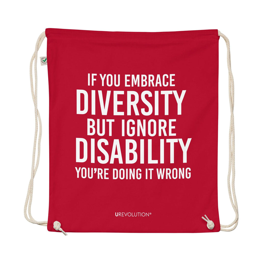 A red Embrace Diversity organic cotton drawstring bag. The middle of the drawstring bag features the phrase, printed in large white upper case letters, "If you embrace diversity but ignore disability, you're doing it wrong." The phrase fills 80% of the bag. 