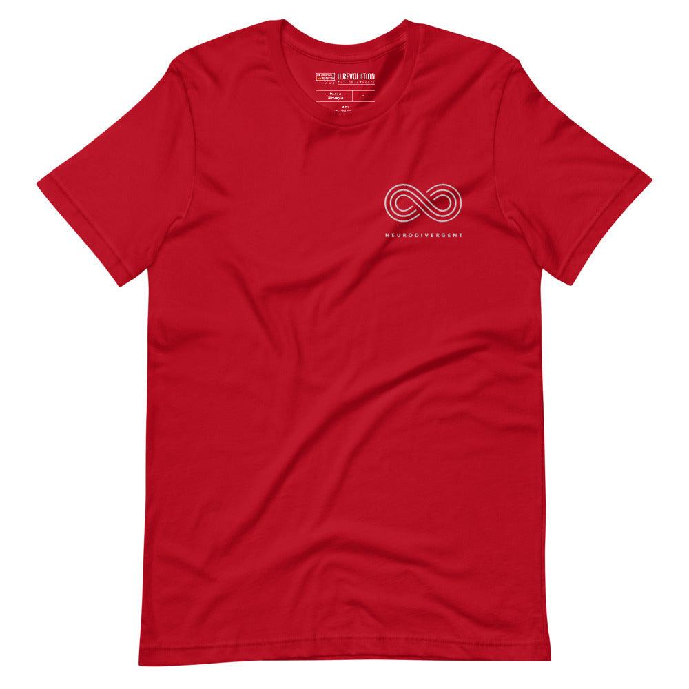 This is a photo of a red embroidered Neurodivergent Tee. In the top left third of the Neurodivergent Hoodie, there is an elegant white infinity symbol consisting of three interwoven white lines. Under the symbol is the word, 'neurodivergent.'