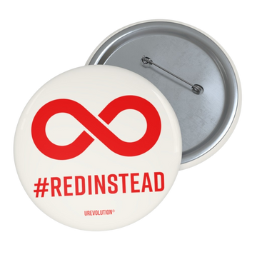 A Red Instead pin button badge. A solid red infinity symbol is in the middle of the soft white pin button. Beneath the symbol is the word #RedInstead printed in bold red upper case letters. 