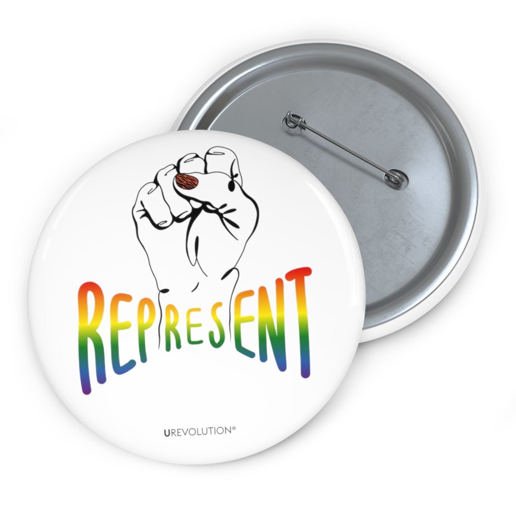 Represent Pride Pin Button. In the middle of the represent pride pinback button is a black line drawing of a raised clenched fist, with the handwritten word "represent," written in blended upper case rainbow pride colors: red, orange, yellow, green, indigo, and violet. Under the fist, at the bottom of the magnet, is the word URevolution in small black upper case letters.
