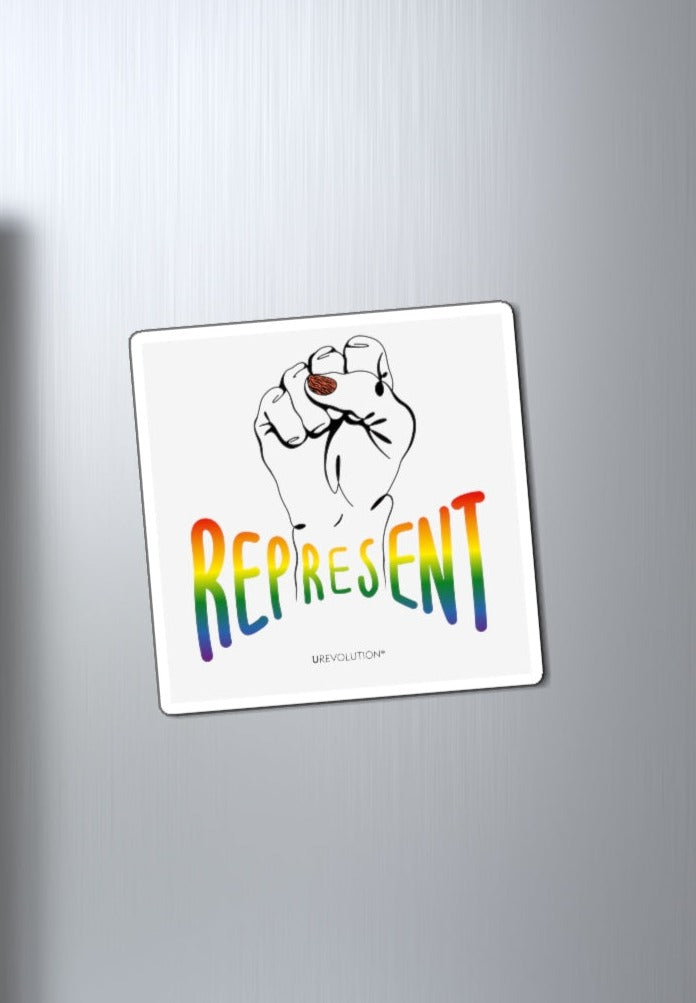 Photo of a square off-white Represent Pride Magnet. In the middle of the represent pride magnet is a black line drawing of a raised clenched fist, with the handwritten word "represent," written in blended upper case rainbow pride colors:  red, orange, yellow, green, indigo, and violet. Under the fist, at the bottom of the magnet, is the word URevolution in small black upper case letters. The pride magnet is displayed by itself on a stainless steel refrigerator door.