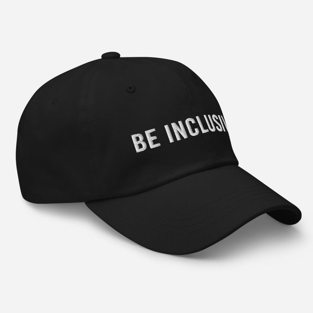 This is a photo of the front of a black cotton twill 'be inclusive cap,' with the phrase "Be Inclusive" embroidered on the front in upper case white letters.