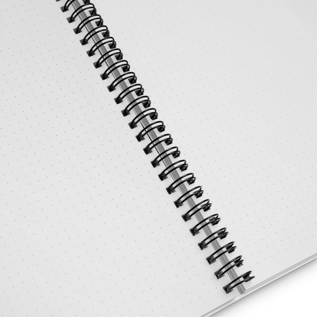 The inside white pages of the Represent notebook.