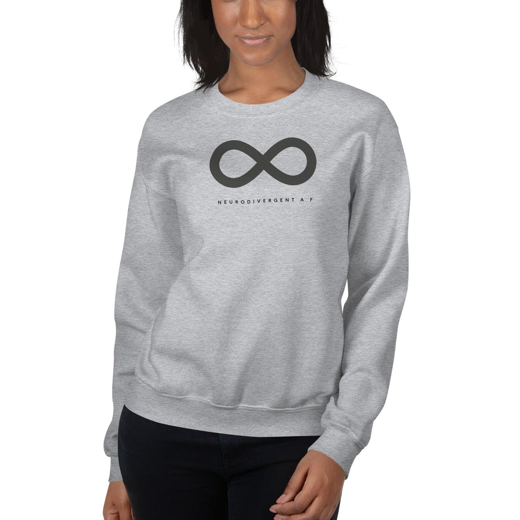 Sport grey Neurodivergent AF sweatshirt. There is a black infinity symbol in the top third of the Neurodivergent AF sweatshirt. Under the symbol is the phrase, 'Neurodivergent AF,' in black upper case letters. The sweatshirt is worn by a female model with only her torso visible.
