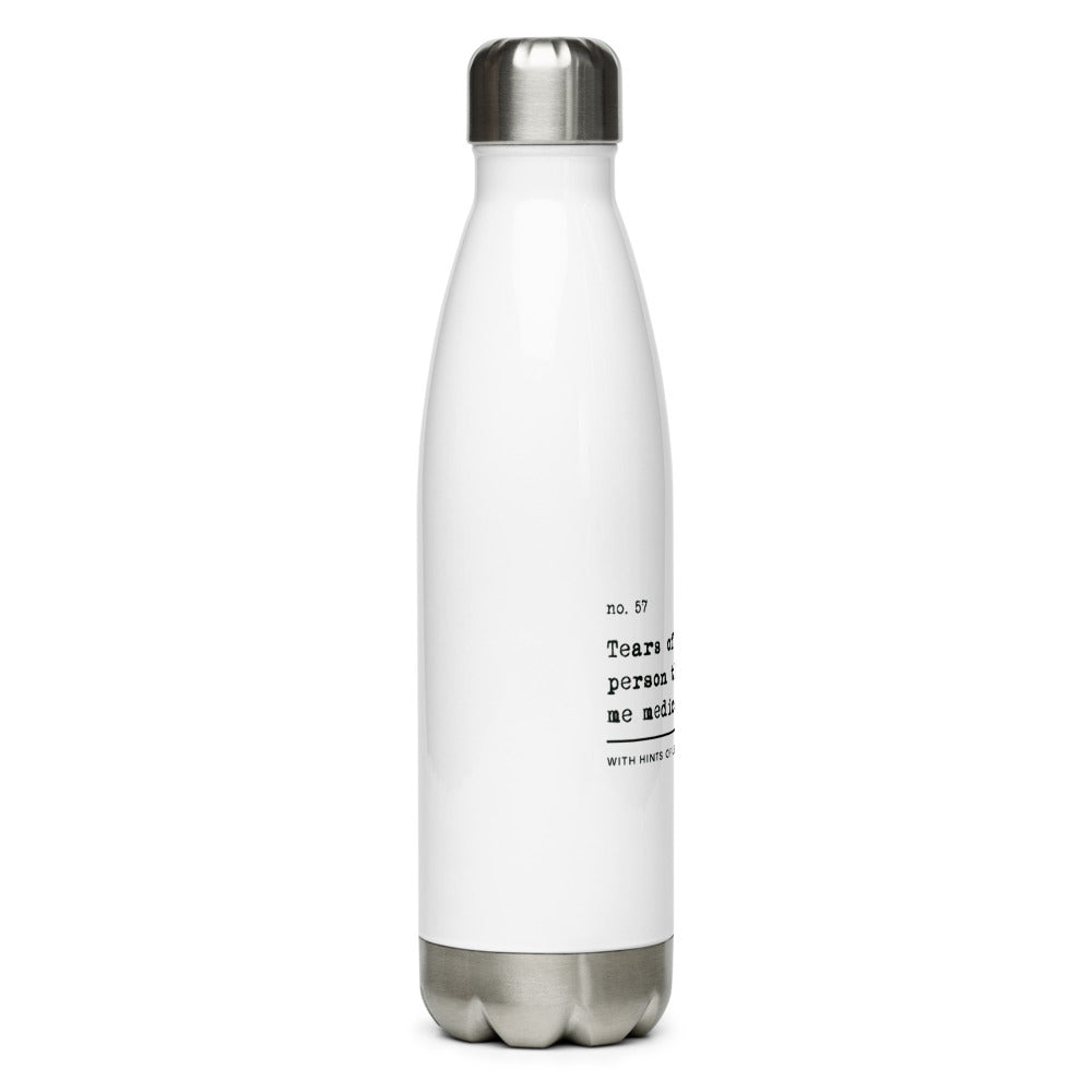 The no medical advice water bottle is white, shaped like a bowling pib, with black text that reads: "no. 57. Tears of the last person that gave me medical advice. With hints of lemon and chamomile." The bottle is shaped like a bowling pin.
