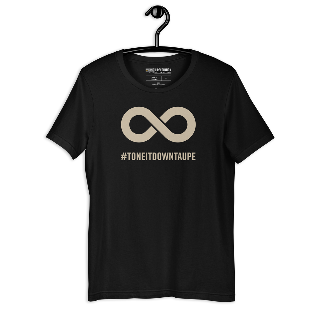 This is a photo of a Tone It Down Taupe shirt. In the the middle top one-third of the tee is a taupe colored infinity symbol. Beneath the symbol is the hashtag word printed in bold upper case letters: #ToneItDownTaupe. The tee is on a black hanger.