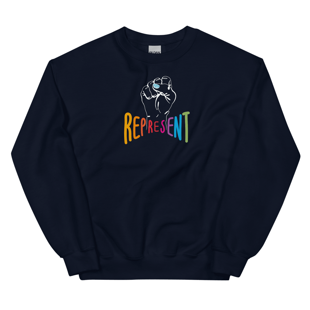 This is a photo of a navy represent sweatshirt. In the middle of the represent sweatshirt is a white line drawing of a raised clenched fist, with the handwritten word “represent,” written in upper case rainbow colors.
