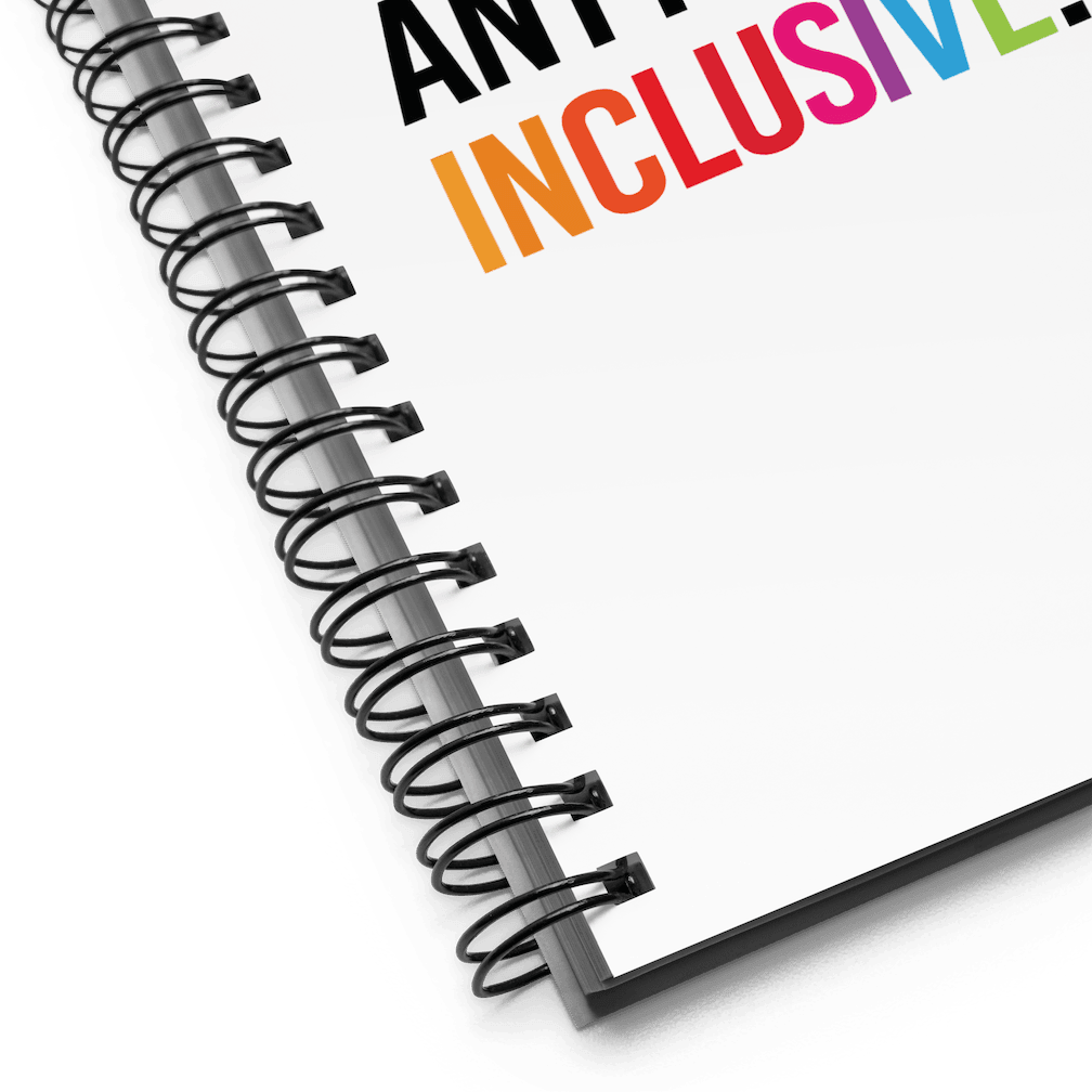 Be Inclusive Journal. The front cover of a white spiral journal with the following phrase printed in the middle of it in upper case letters: 'If you can be anything, be inclusive.' The word inclusive is in the color of the rainbow. 