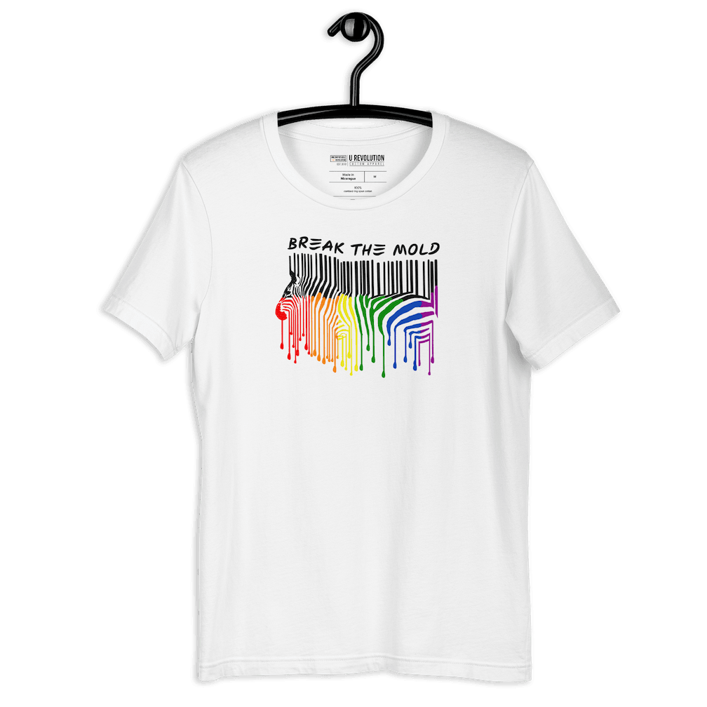 This is a photo of a Break the Mold t-shirt. In the middle of the t-shirt is a graphic of zebra in the silhouette of a barcode. The top half of the zebra are vertical black stripes, which then change just below the back into the colors of the rainbow. The bottom of each stripe has a paint drip mark. Just above the zebra's back is the phrase, in upper case, 'break the mold.'