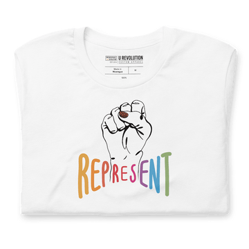 Folded white represent t-shirt. In the middle of the represent shirt is a black line drawing of a raised clenched fist, with the handwritten word "represent," written in upper case rainbow colors.