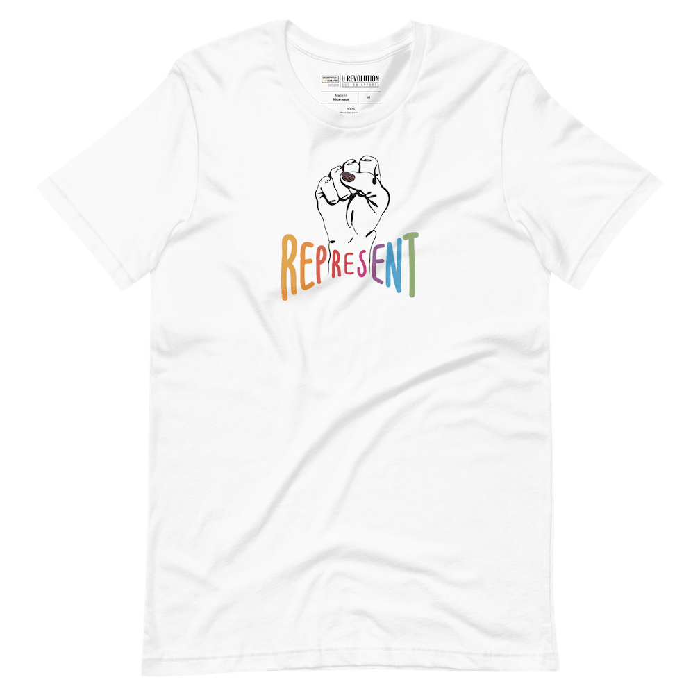 White represent t-shirt. In the middle of the represent shirt is a black line drawing of a raised clenched fist, with the handwritten word "represent," written in upper case rainbow colors.