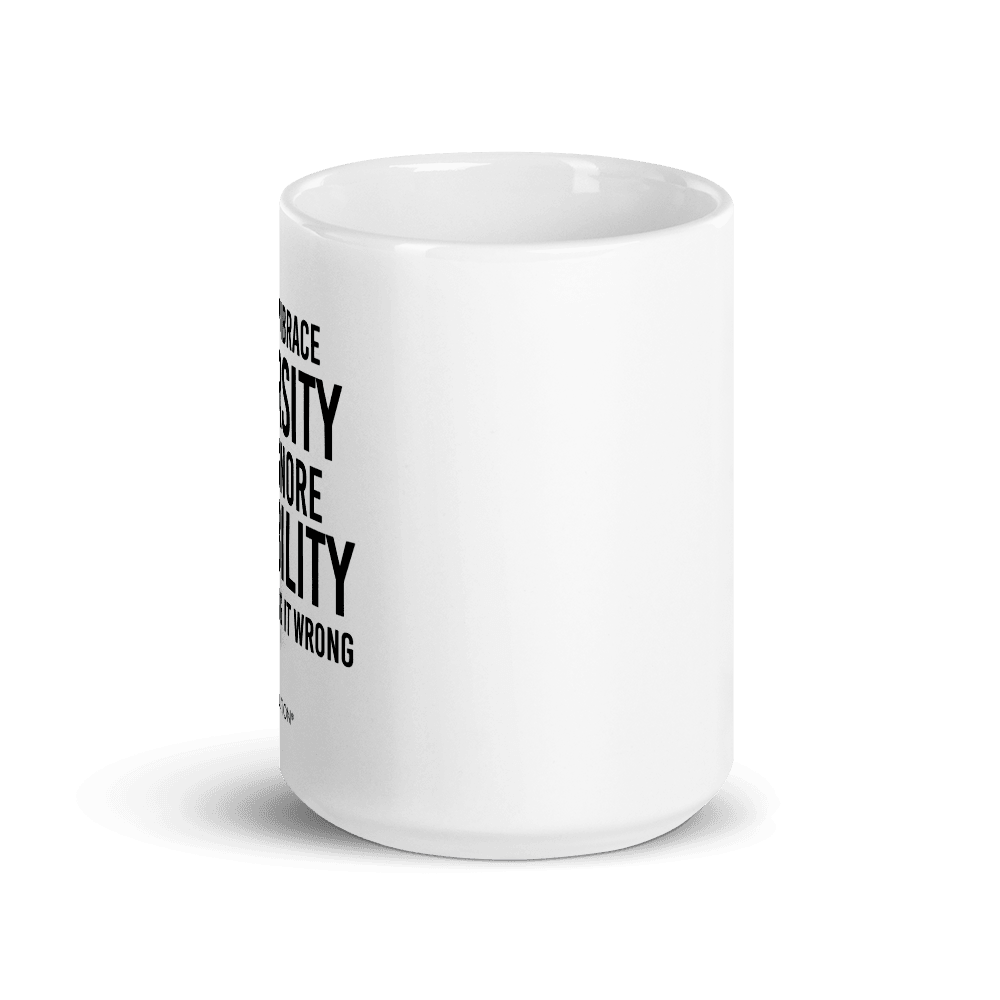 Photo of a white embrace diversity mug. The embrace diversity mug has a phrase printed in black in upper case letters: "If you embrace diversity but ignore disability, you're doing it wrong." The phrase takes up ¾ of the front side of the mug.