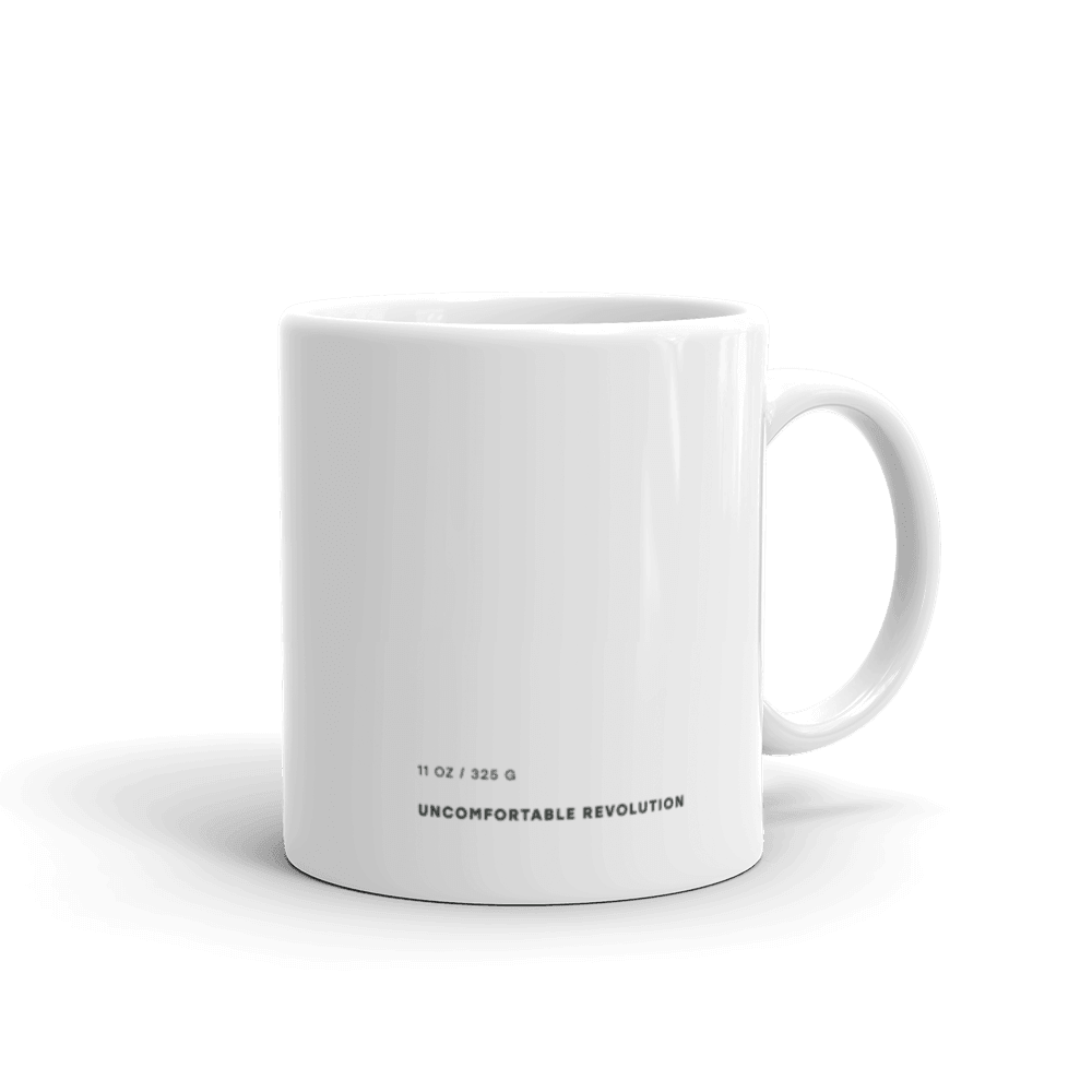 The left side view of the ableist tears mug wit the words, uncomfortable revolution, in small upper case letters printed at the base.