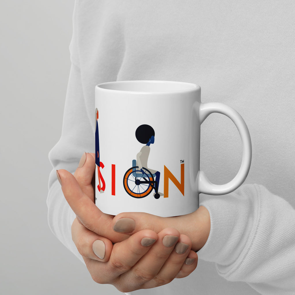 This is a photo of a white inclusion mug with URevolution's Inclusion icon on the side. The word INCLUSION is written in all caps in rainbow colors. Among the letters are four characters: one plus-sized person with glasses and a cane, one person with one arm wearing a turban, one person with long hair and a prosthetic leg, and one person with an afro, seated in a wheelchair.