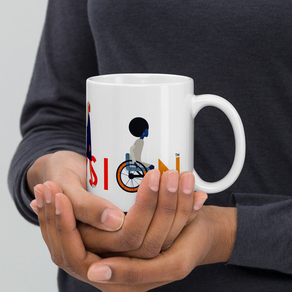 This is a photo of a white inclusion mug with URevolution's Inclusion icon on the side. The word INCLUSION is written in all caps in rainbow colors. Among the letters are four characters: one plus-sized person with glasses and a cane, one person with one arm wearing a turban, one person with long hair and a prosthetic leg, and one person with an afro, seated in a wheelchair.