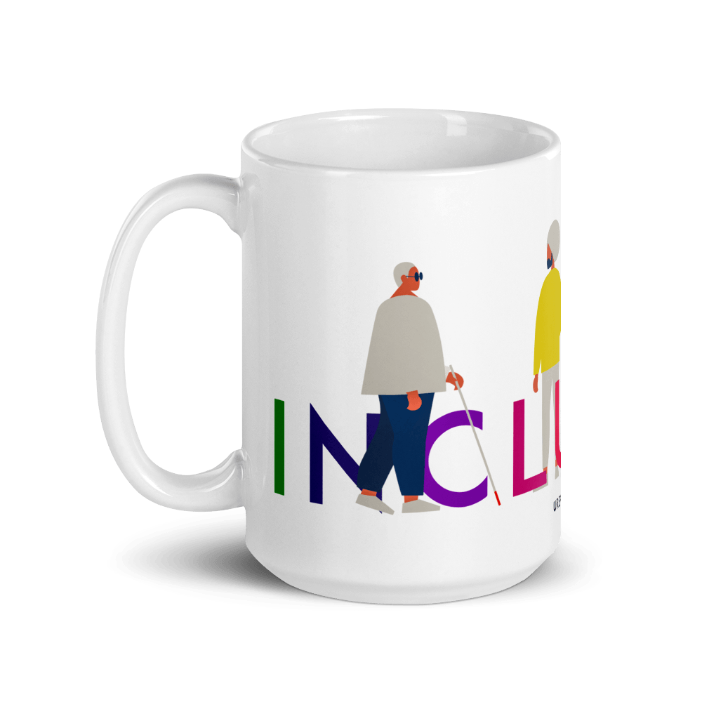 This is a photo of a white inclusion mug with URevolution's Inclusion icon on the side. The word INCLUSION is written in all caps in rainbow colors. Among the letters are four characters: one plus-sized person with glasses and a cane, one person with one arm wearing a turban, one person with long hair and a prosthetic leg, and one person with an afro, seated in a wheelchair.