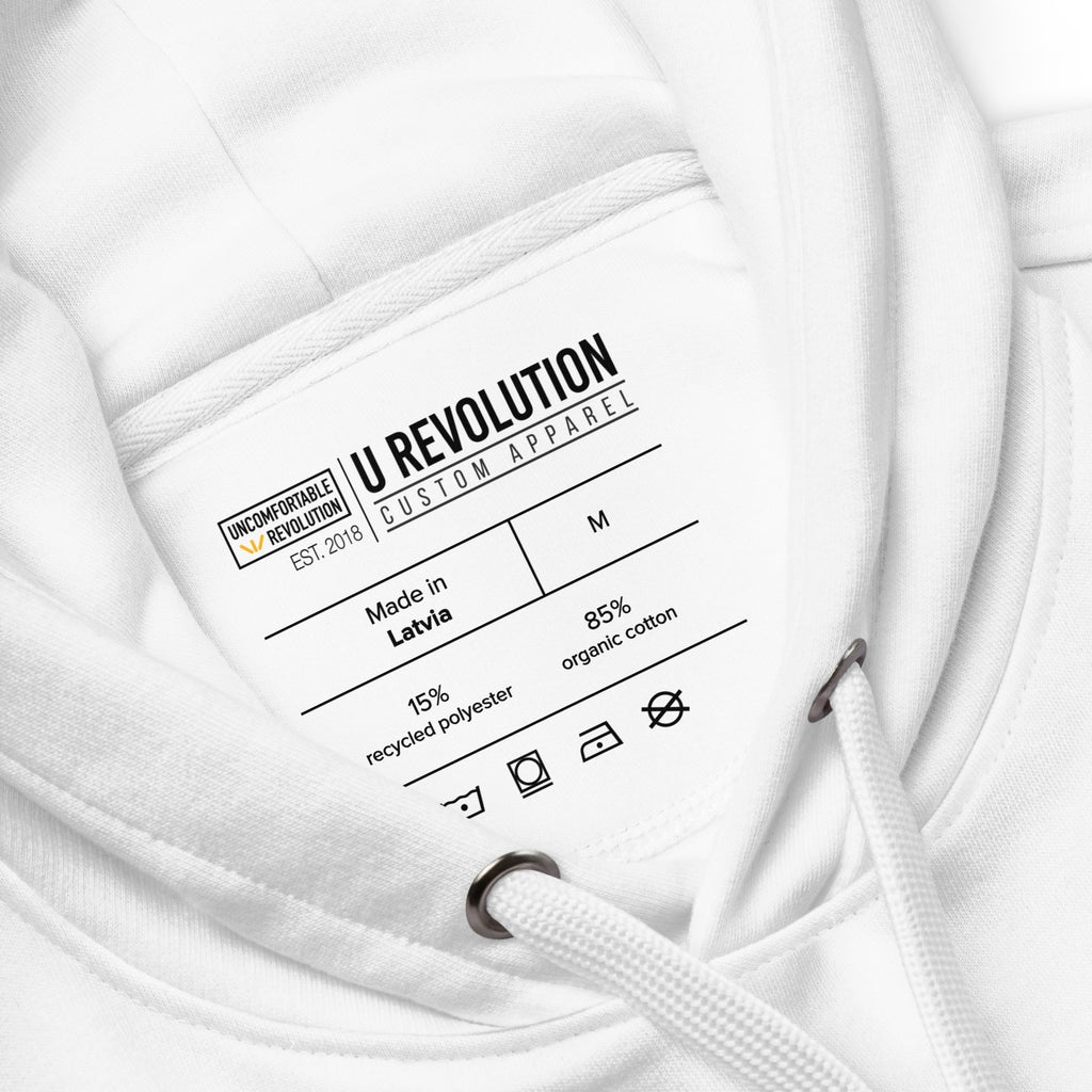 Photo of a white premium eco-friendly be inclusive hoodie. In the top one-third of the hoodies is the phrase, 'If you can be anything, be inclusive.' printed on it in black upper case letter. The word 'inclusive' is printed in rainbow-like colors. 