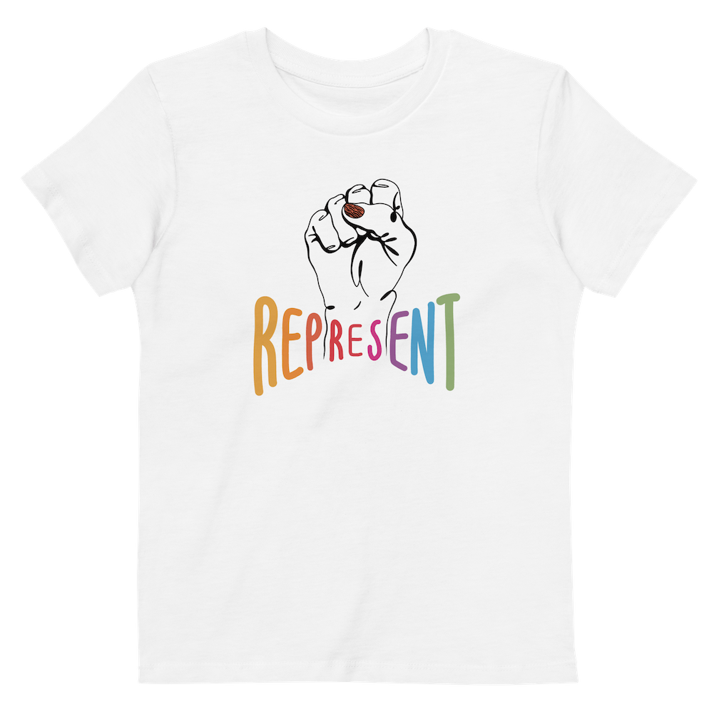 Photo of an organic kids white Represent tee. In the center of the organic tee is a black drawing of a raised clenched fist, with the handwritten word “represent,” written in upper case rainbow colors beneath the fist.