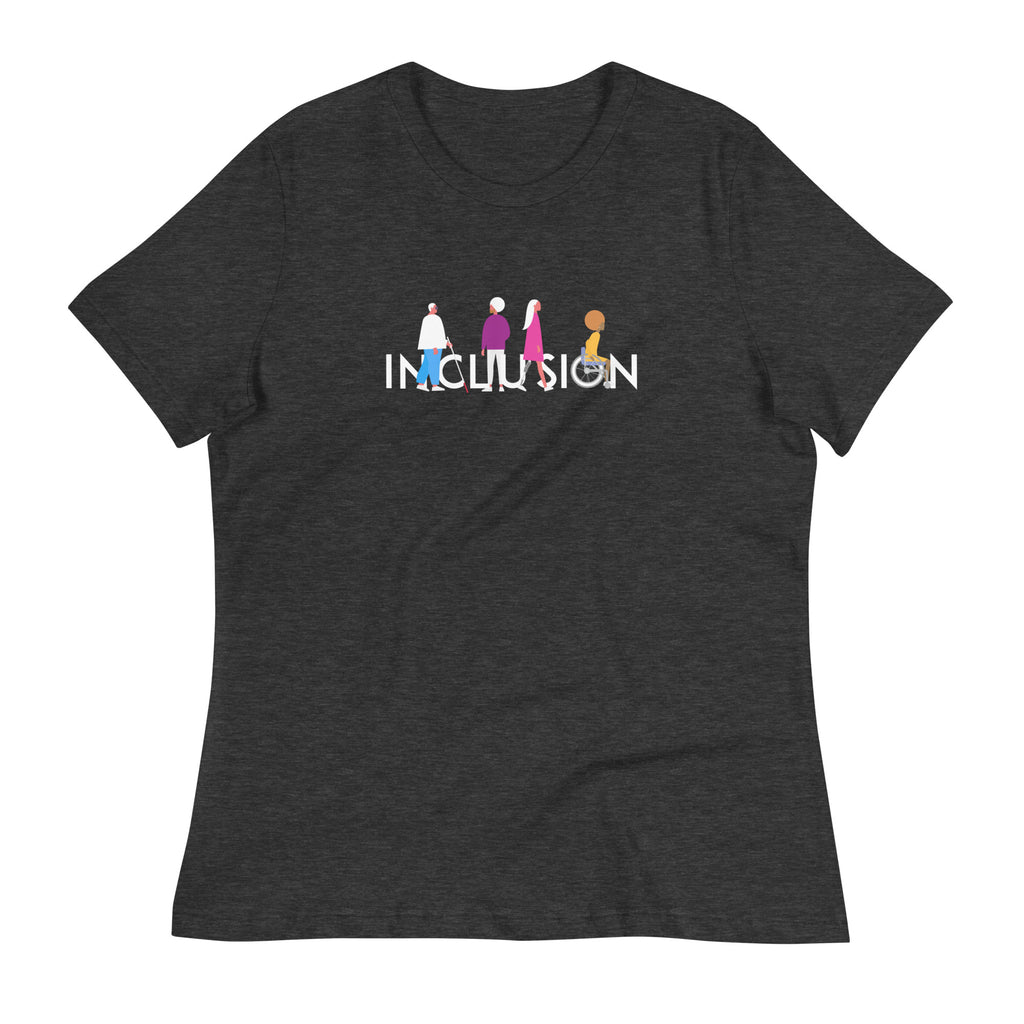 A photo of a relaxed Inclusion tee. The tee has the iconic INCLUSION logo printed on it: the word INCLUSION is printed in large white type in the colors of the rainbow. Four diverse disabled people are incorporated into the word INCLUSION. Under the words, printed in small white upper case text, is the word - URevolution.