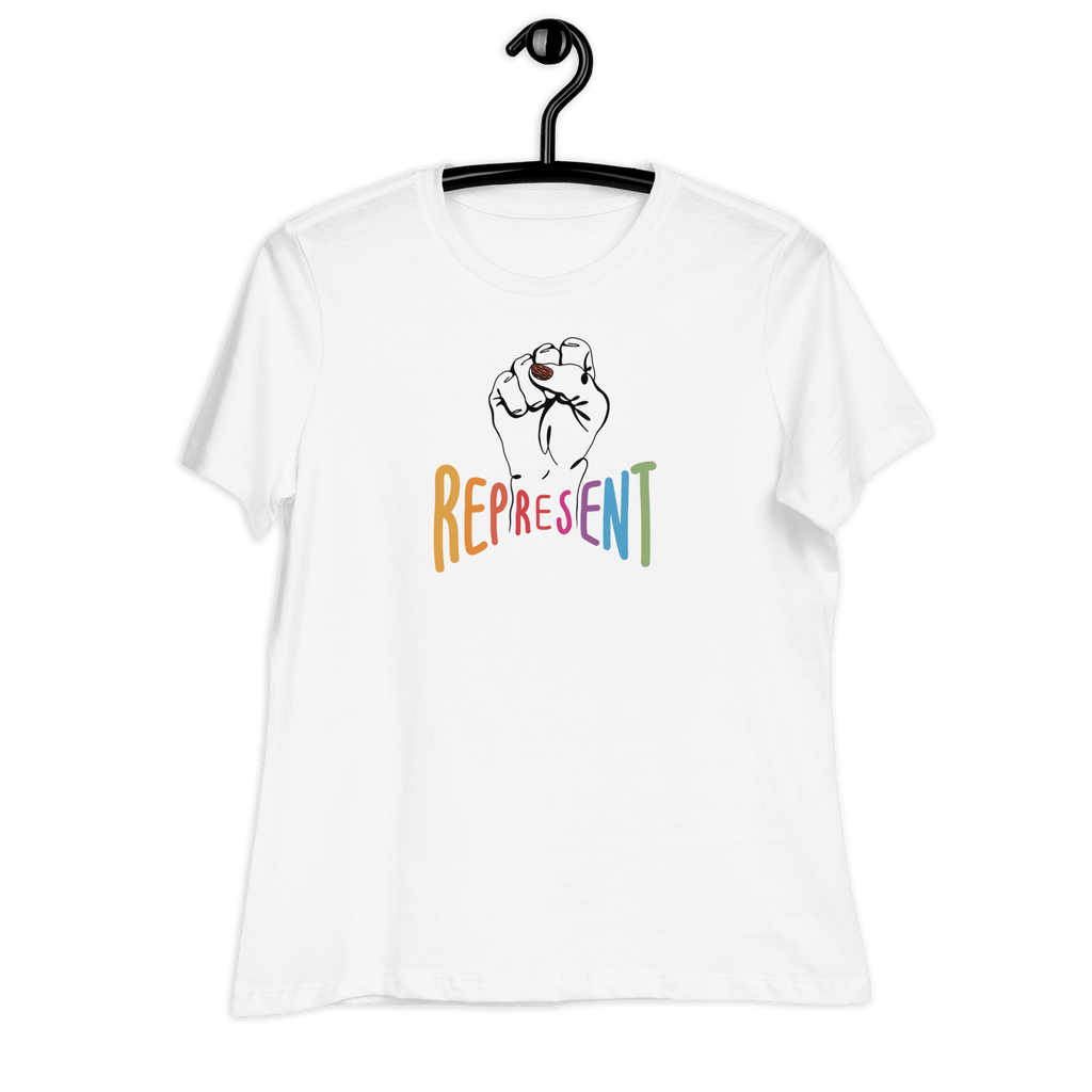 Photo of white Represent Tee. In the middle of the represent tee is a black line drawing of a raised clenched fist, with the handwritten word “represent,” written in upper case rainbow colors.